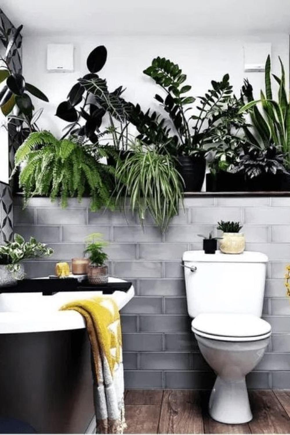 Vibrant rainforest-themed bathroom featuring a variety of indoor plants
