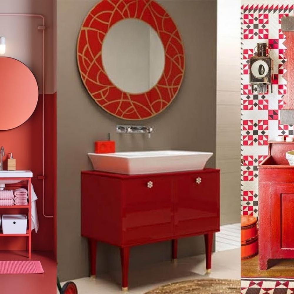 A sleek modern red vanity with a glossy finish, white rectangular sink, and decorative red framed mirror.