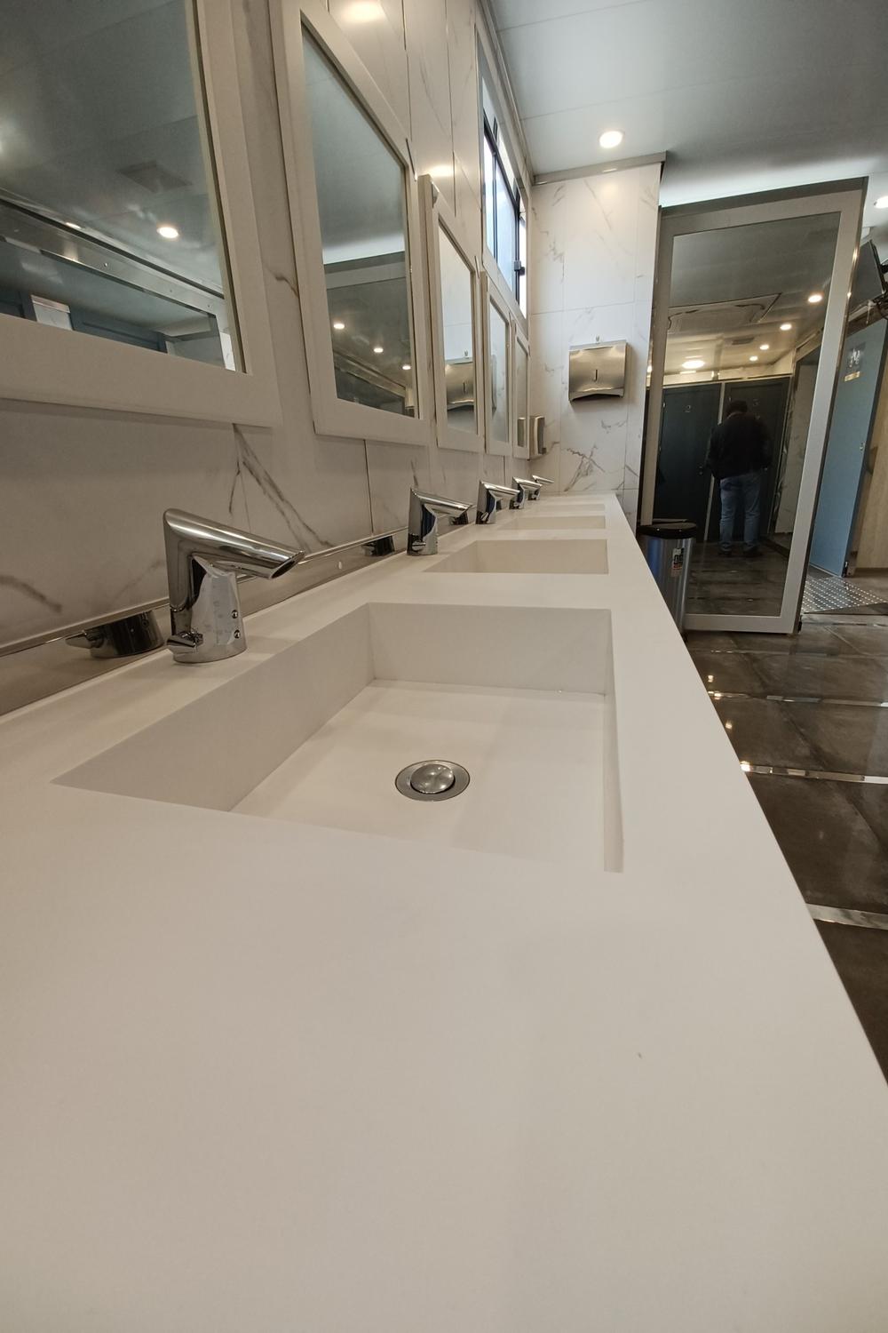 Modern and elegant public bathroom with luxurious aesthetics