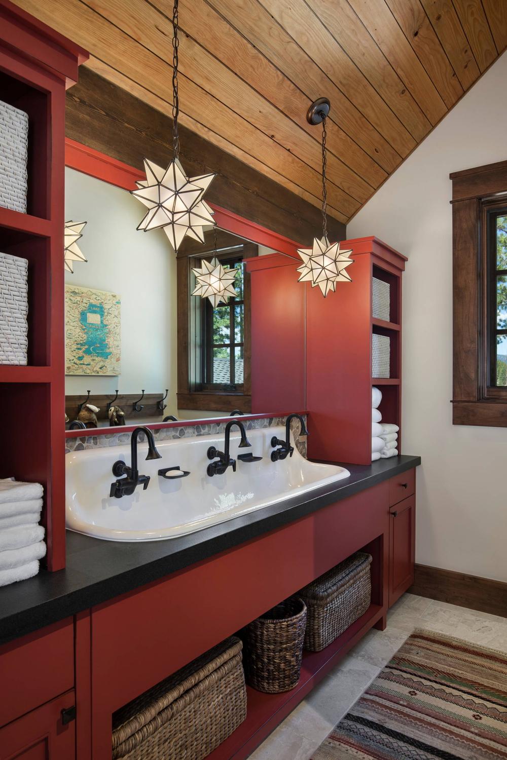 Rustic bathroom with potted plants and natural materials exuding charm.