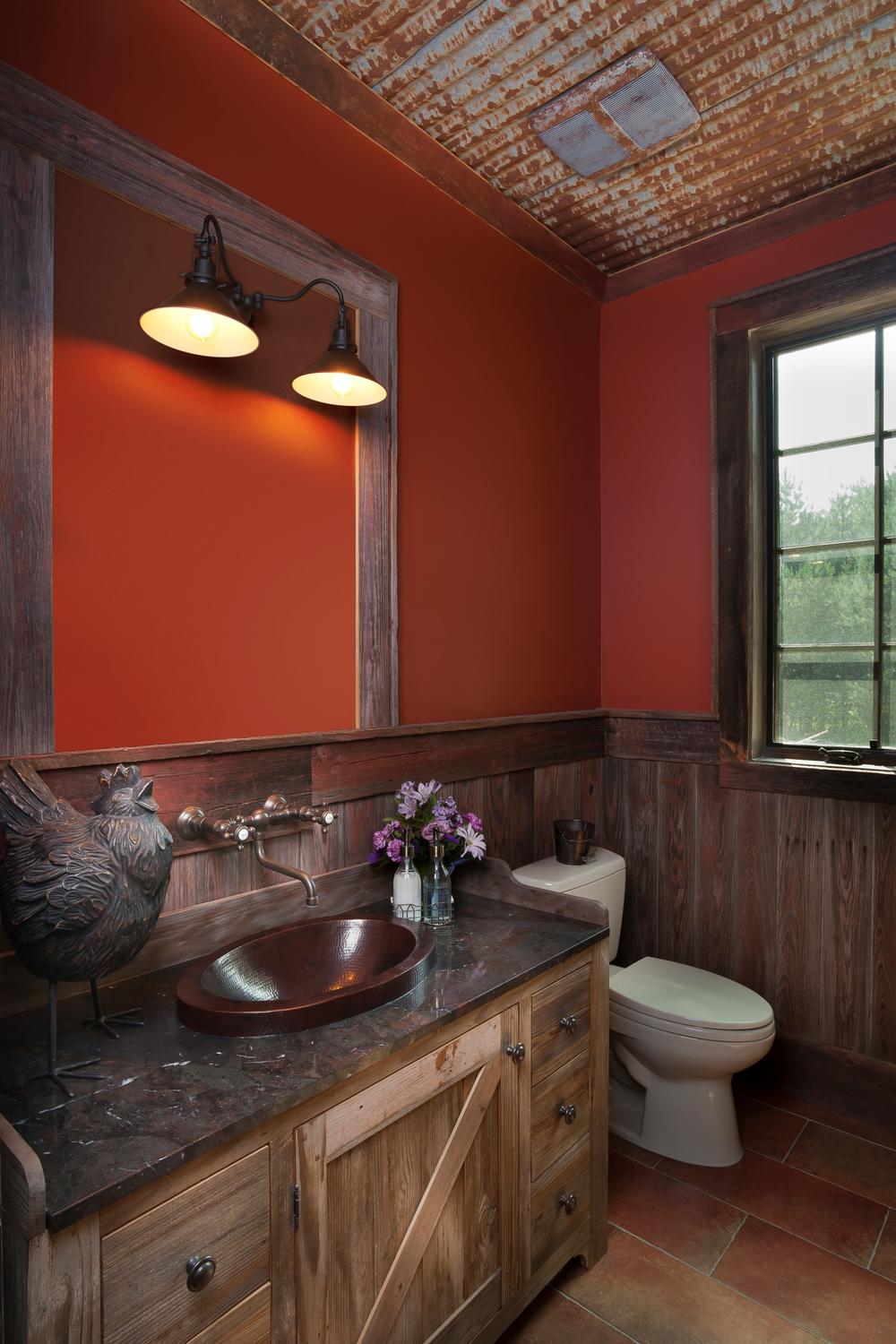 Stylish rustic bathroom with metal and textile combinations enhancing aesthetic.