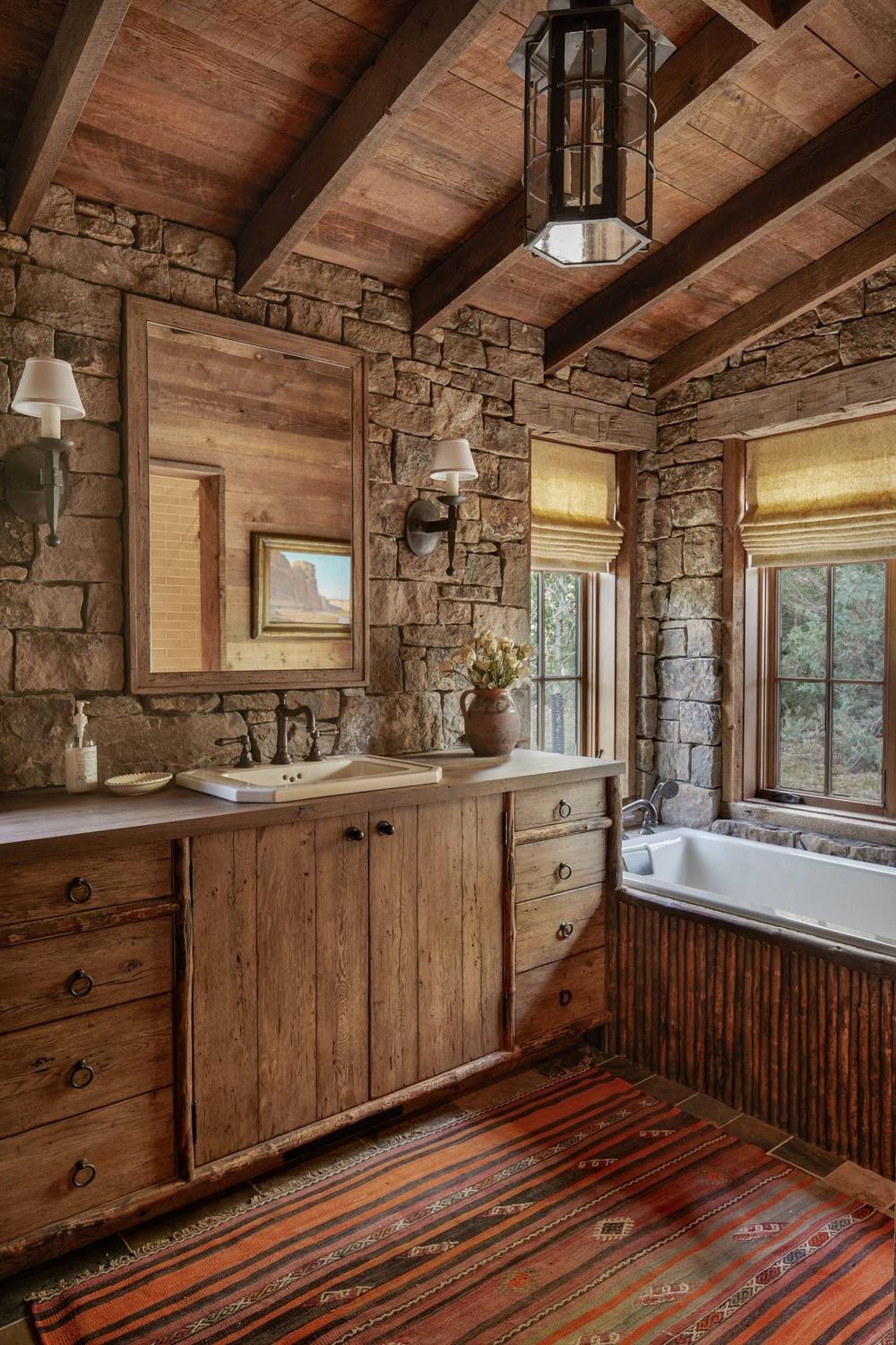 Inviting rustic bathroom highlighting textures and color warmth.