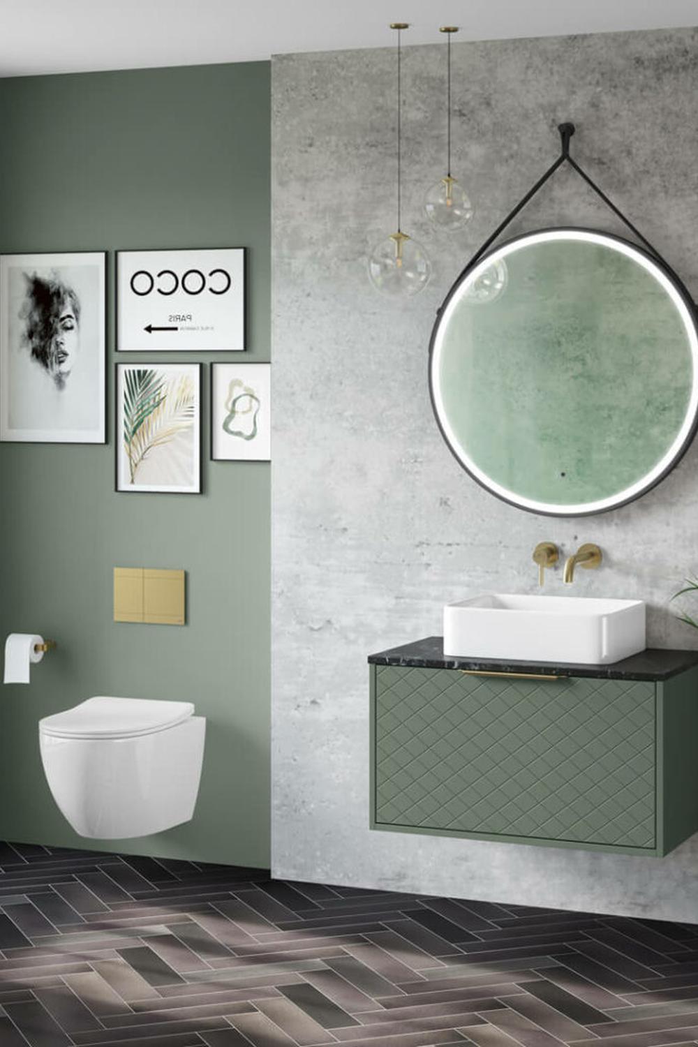 Modern bathroom with a wall-mounted vanity and artistic sage-colored wall decor.