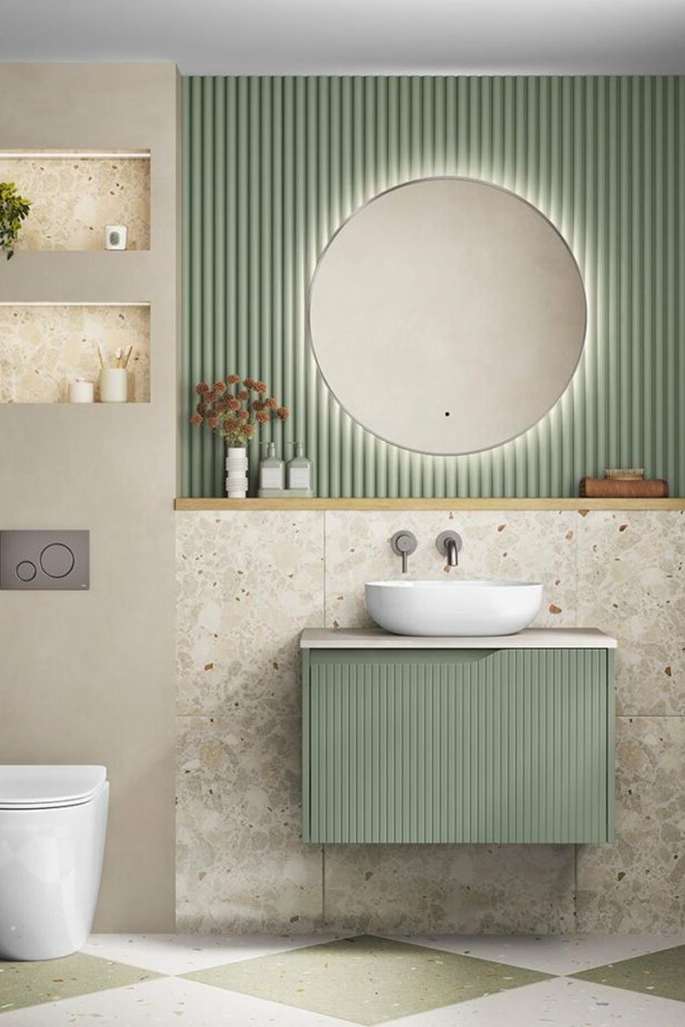 bathroom with sage green paneling and minimalistic design