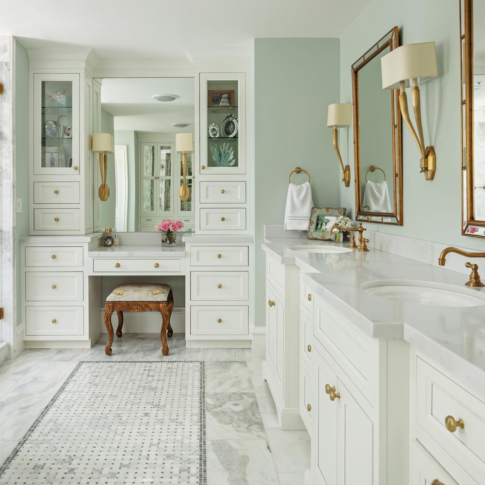 modern bathroom with glossy finishes and sage accents