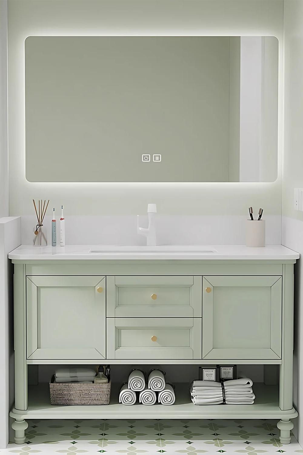 Elegant sage green storage vanity achieving a perfect balance between utility and style.