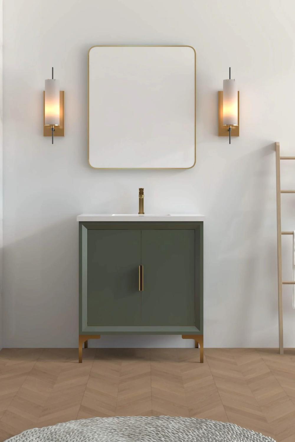 Nature inspired sage green vanity paired with subtle design elements that graciously welcome relaxation.