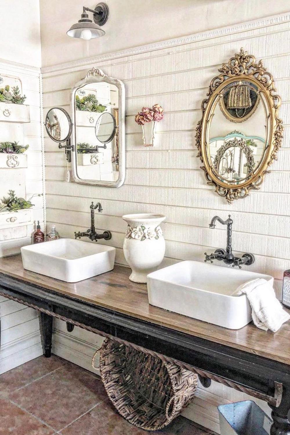Rustic wooden vanity with dual vessel sinks in a shabby chic bathroom