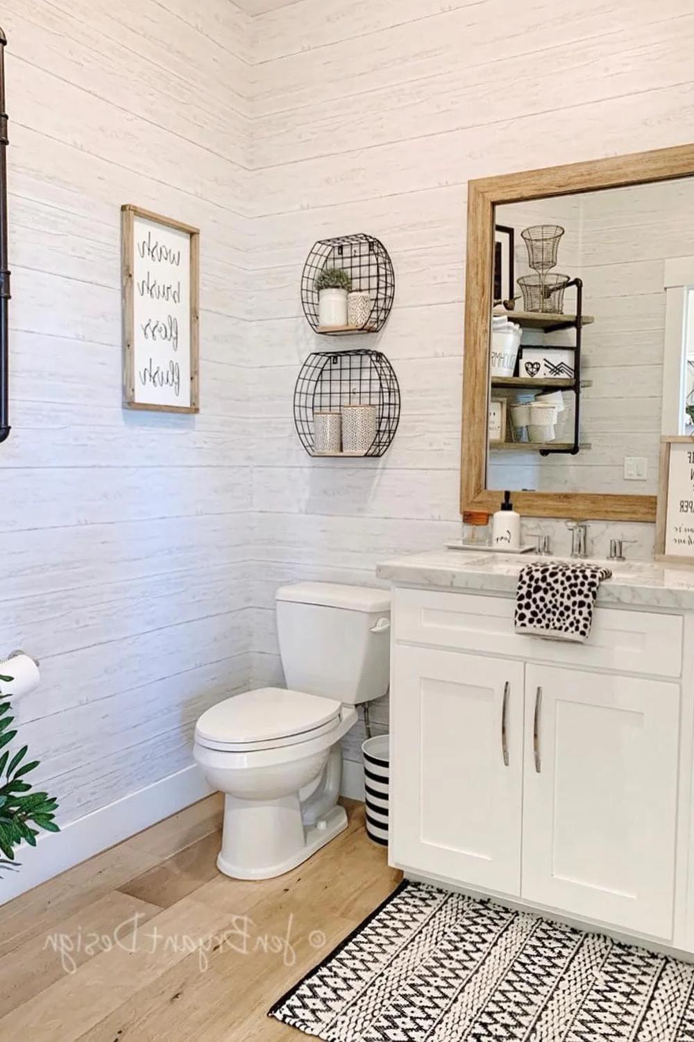 Stylish bathroom featuring white shiplap and modern decor elements