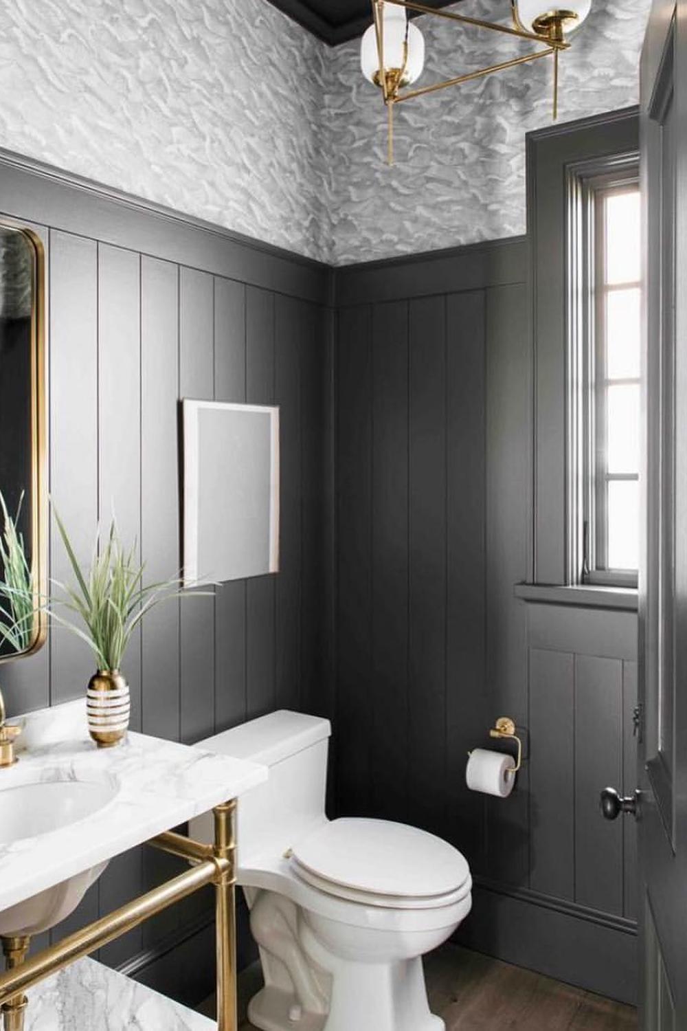 Modern bathroom featuring gray shiplap and clean wallpaper