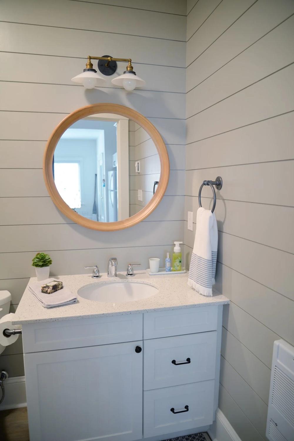 Stylish bathroom with soft gray shiplap and inviting decor