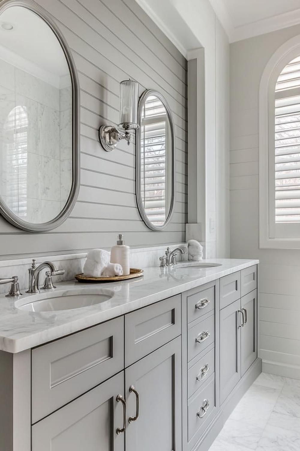 Symmetrically designed bathroom with elegant fixtures