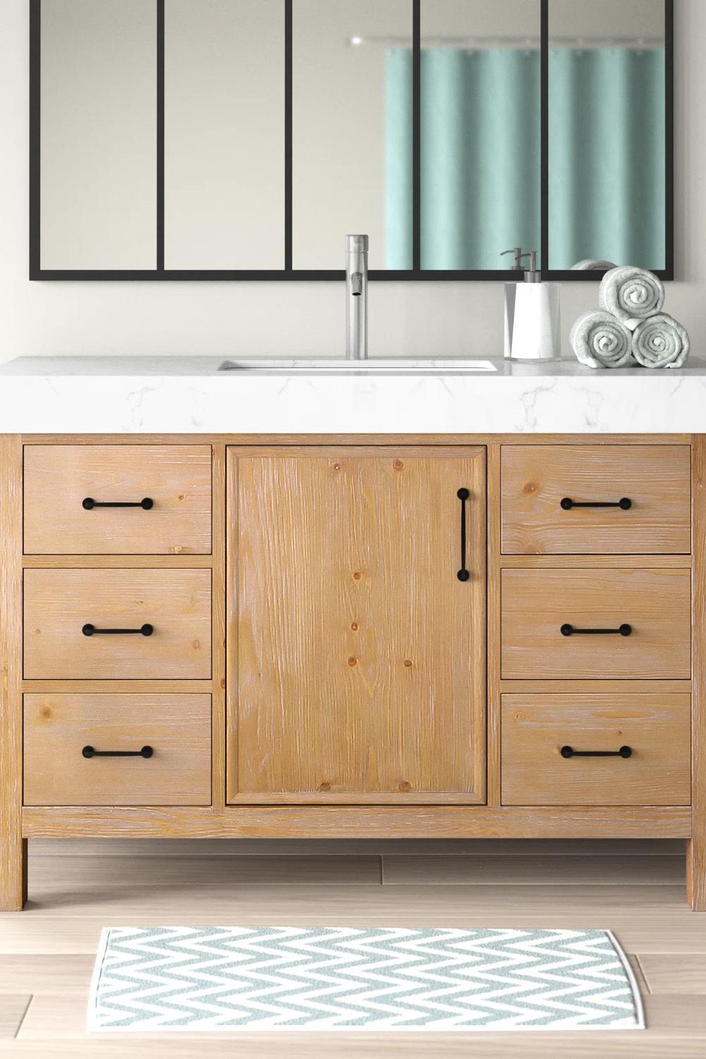 Moderno mueble de baño de madera clara y minimalista