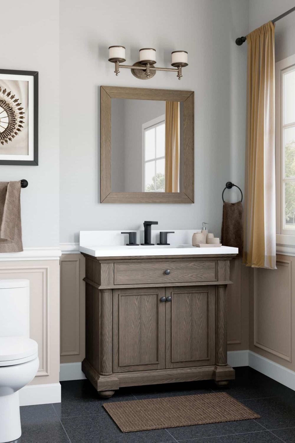A timeless single bathroom vanity in gray finish featuring a white countertop and double faucets.