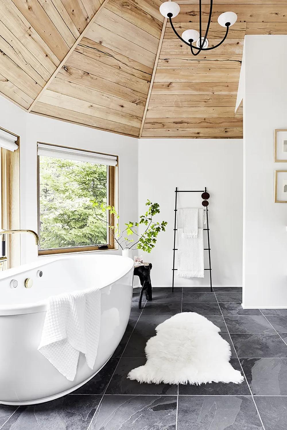 A beautifully designed bathroom with modern slate tile elements