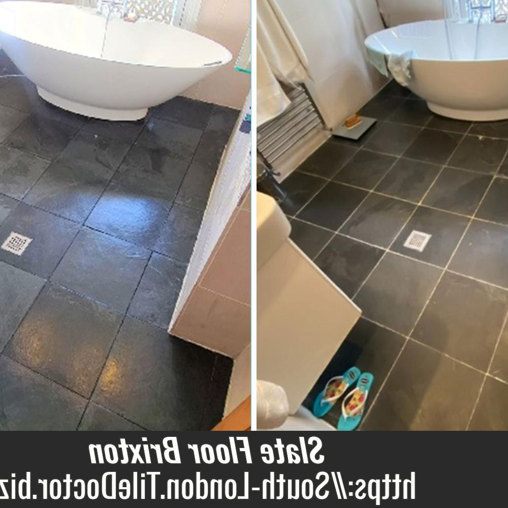 Contemporary bathroom area with dark slate tile flooring
