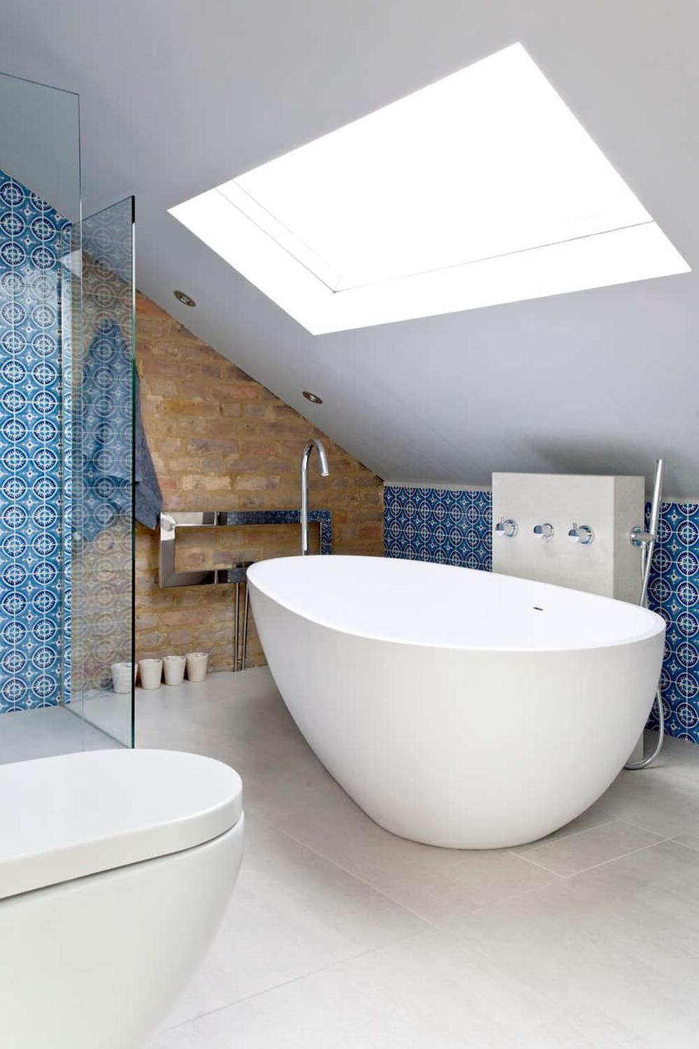 Modern bathroom with white decor and colorful tile accents