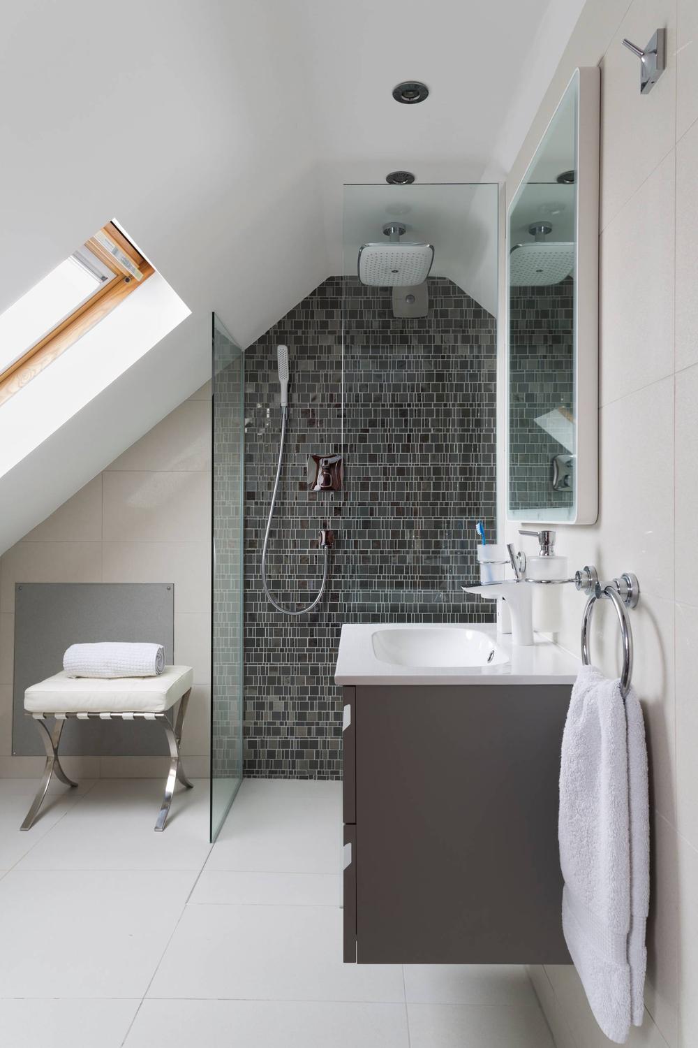 Bright bathroom with recessed lighting and clean aesthetics