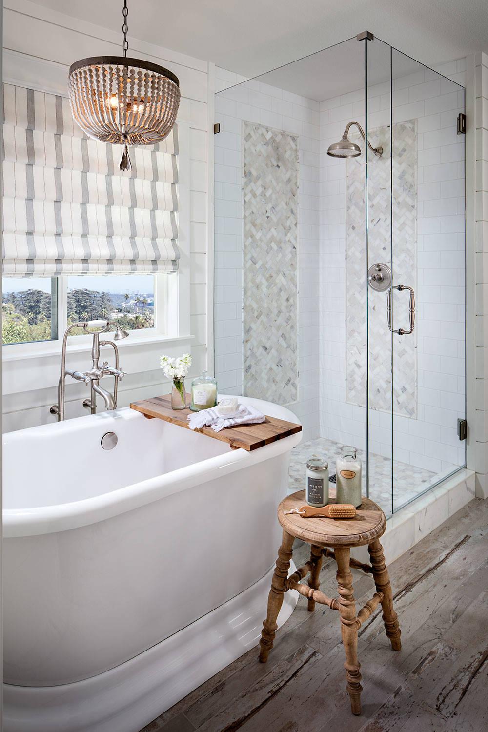 A rustic meets modern small luxury bathroom with elegant charm