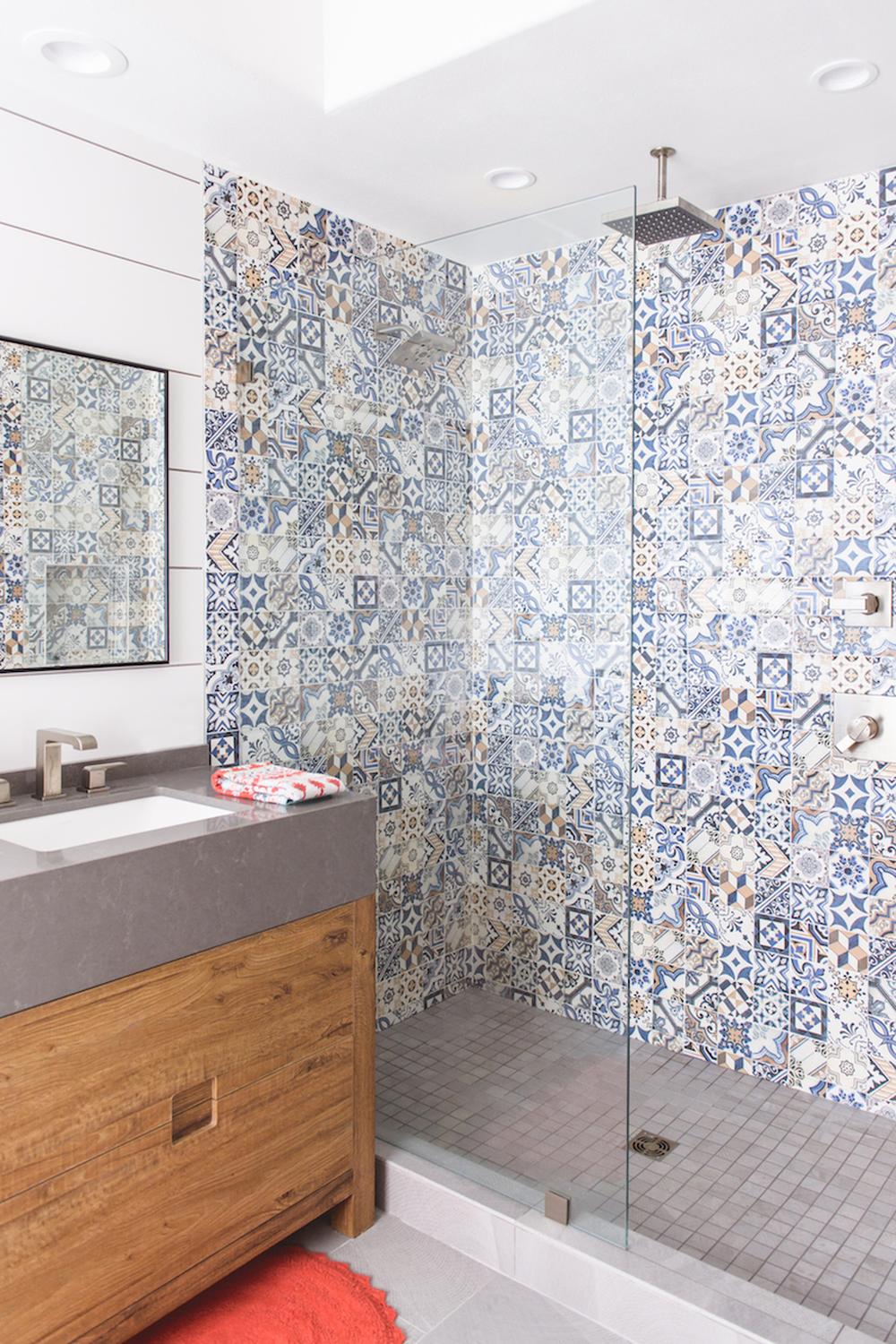Sophisticated bathroom with monochromatic Spanish tile elements