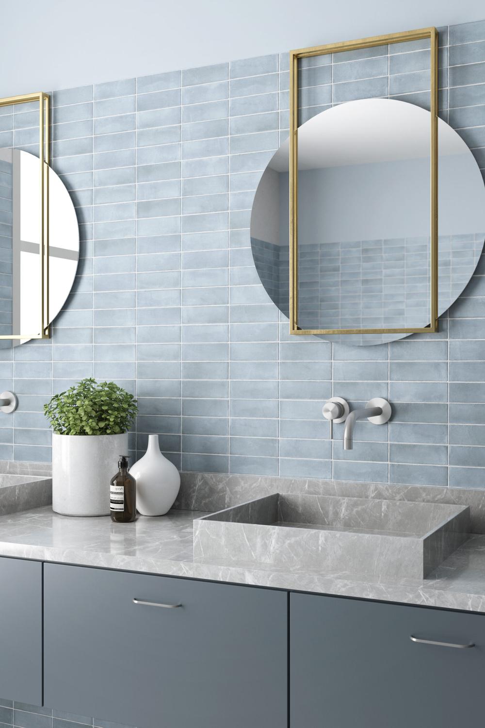 Modern bathroom with light blue Spanish tile accents