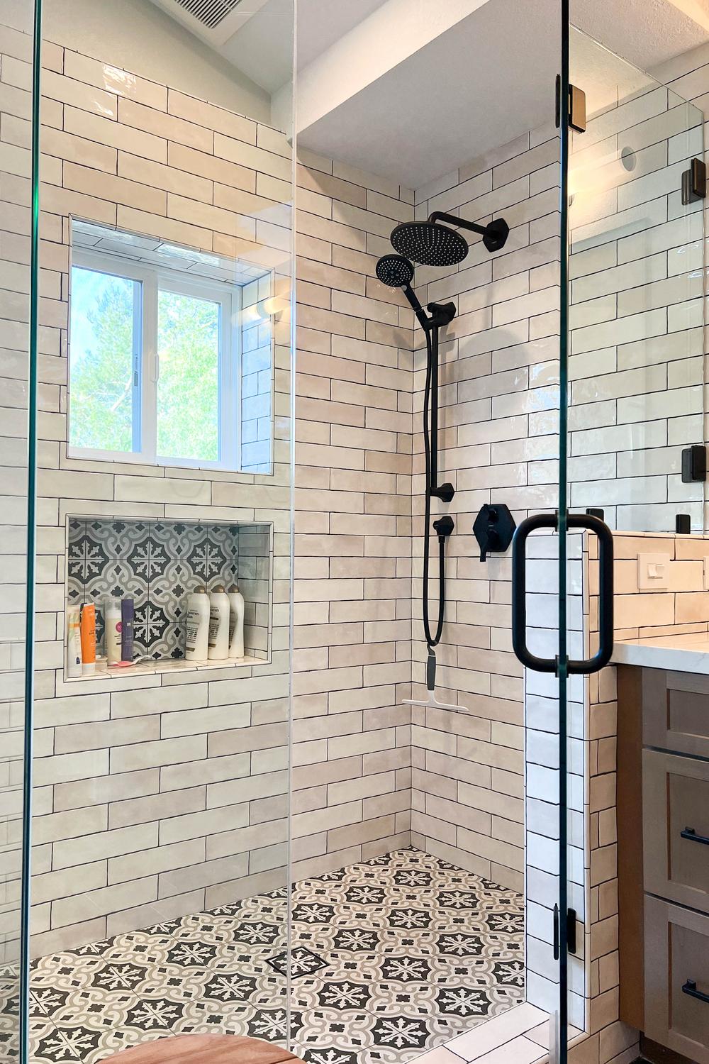 Spacious shower retreat with Spanish tile design