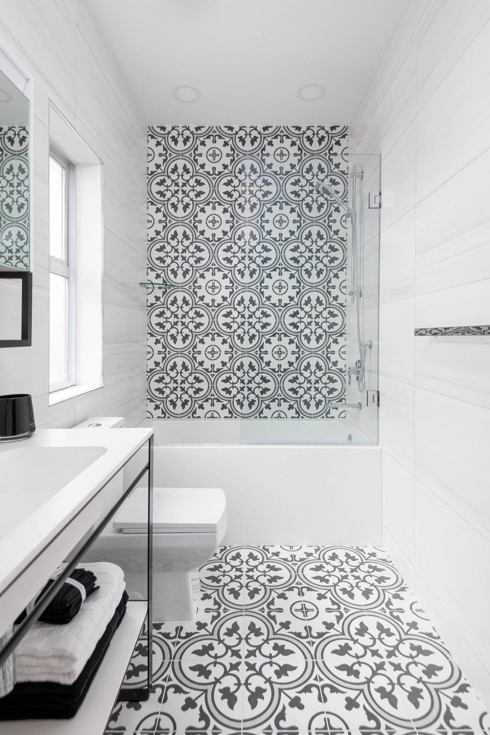 Elegant black and white tile bathroom design