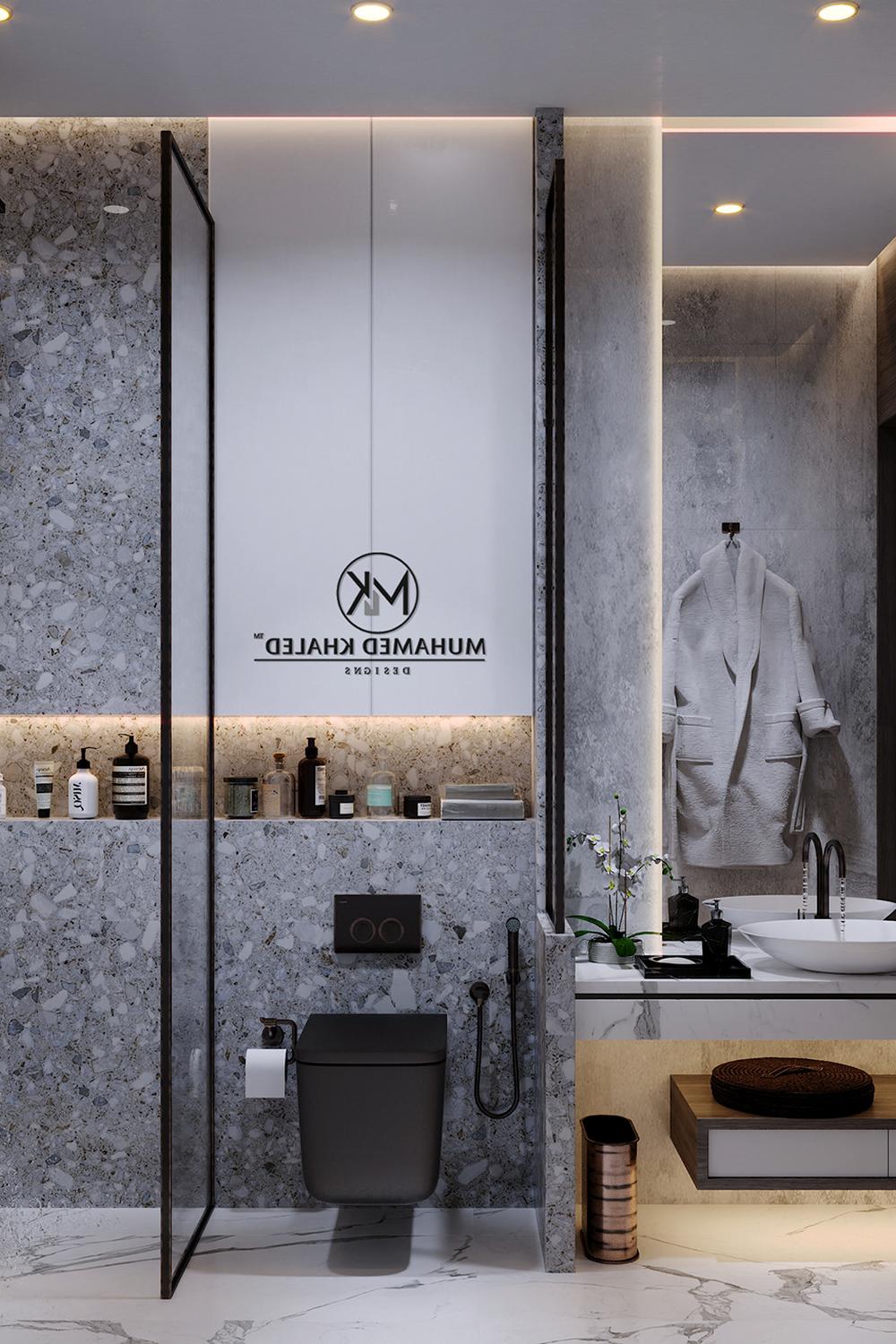 Baño moderno con azulejos de terrazo y decoración cálida