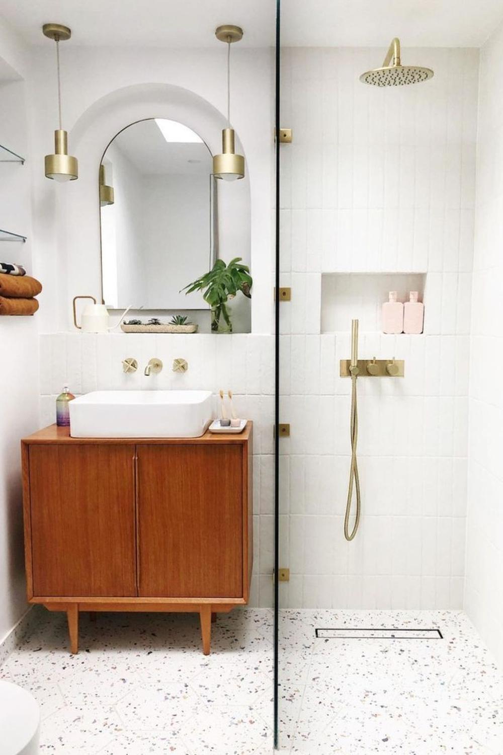 Comfortable and stylish modern bathroom design with terrazzo.