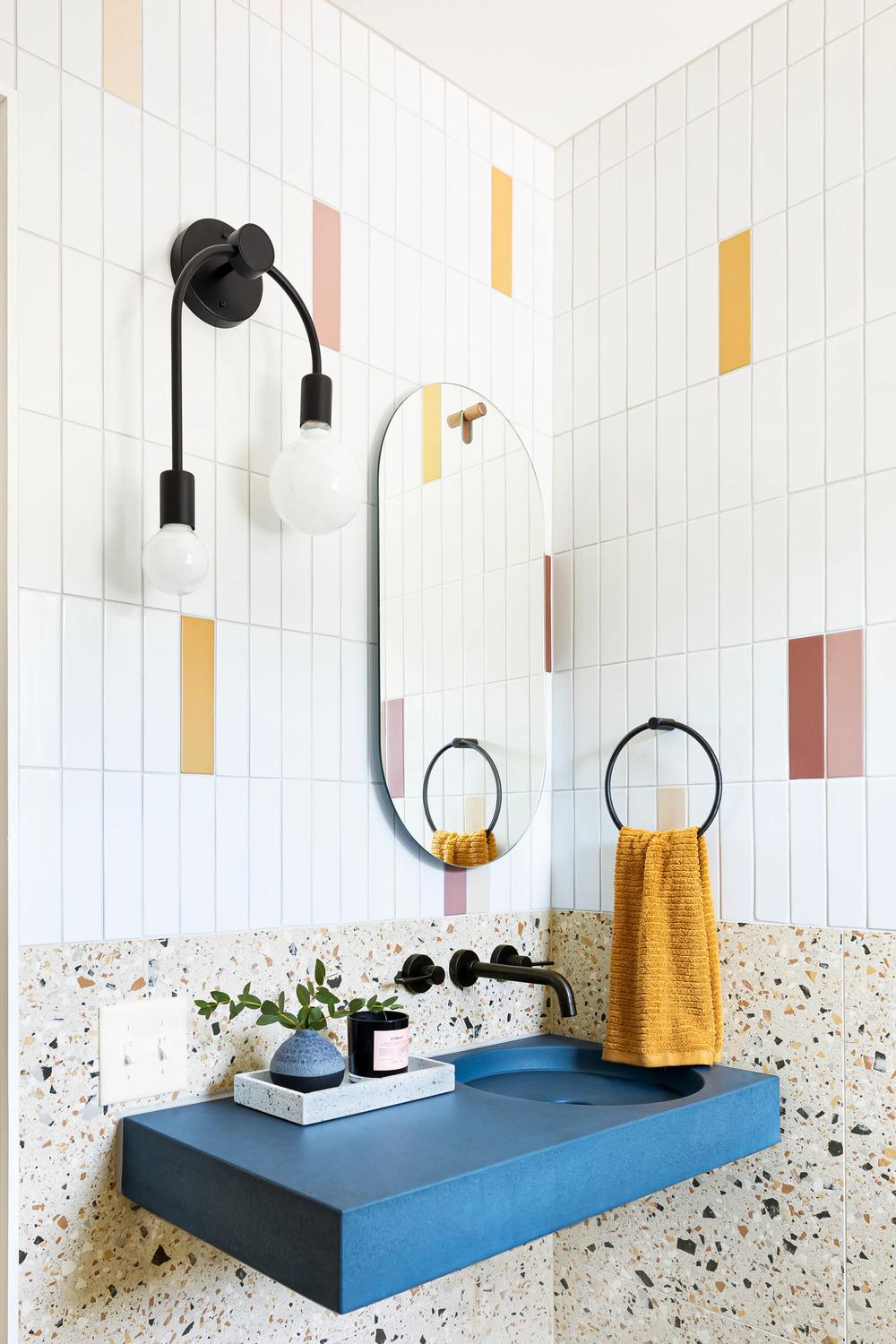 Inviting modern bathroom with warm earthy tones and stylish elements.