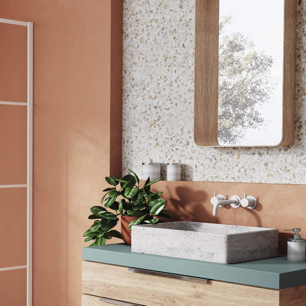 Welcoming bathroom design showcasing earthy tones with terrazzo accents.