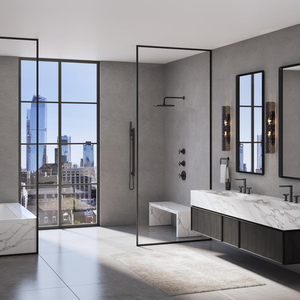 Modern bathroom with a serene gray color scheme, double vanity, and freestanding tub that exemplifies timeless design.