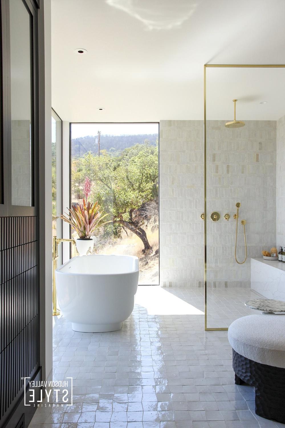 Calm bathroom featuring intricate details and modern appeal with natural light beautifully integrated.