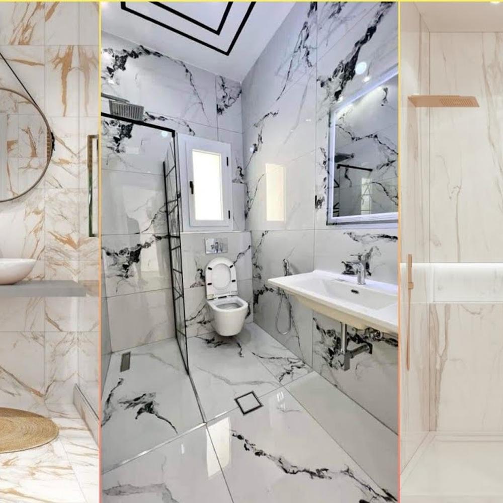 Bathroom featuring luxurious black and gold veined tiles for a modern aesthetic.