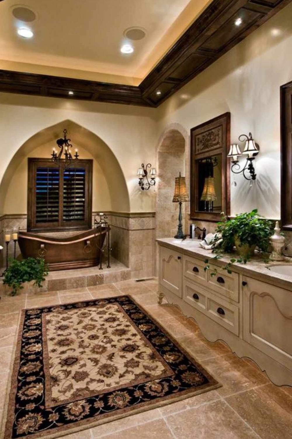 Baño Toscano con bañera de cobre y luz ambiental