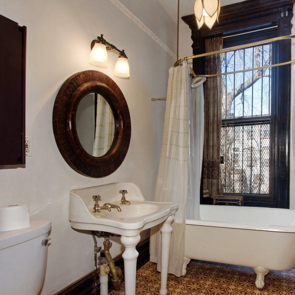 A beautifully designed Victorian bathroom with vintage charm and modern conveniences.