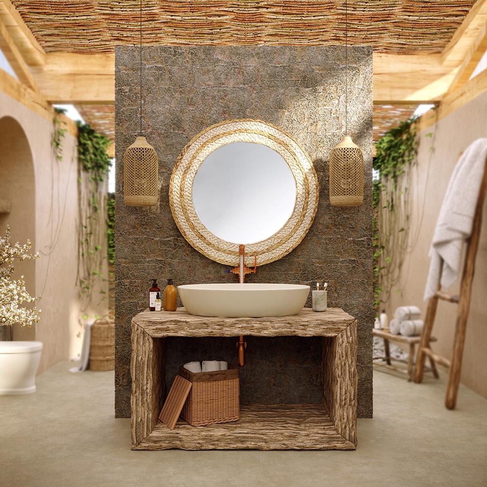 Baño wabi-sabi con pared de piedra y mueble de madera rústica.