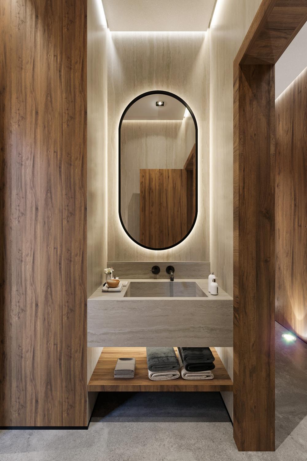 Baño wabi-sabi con madera y piedra contraste.