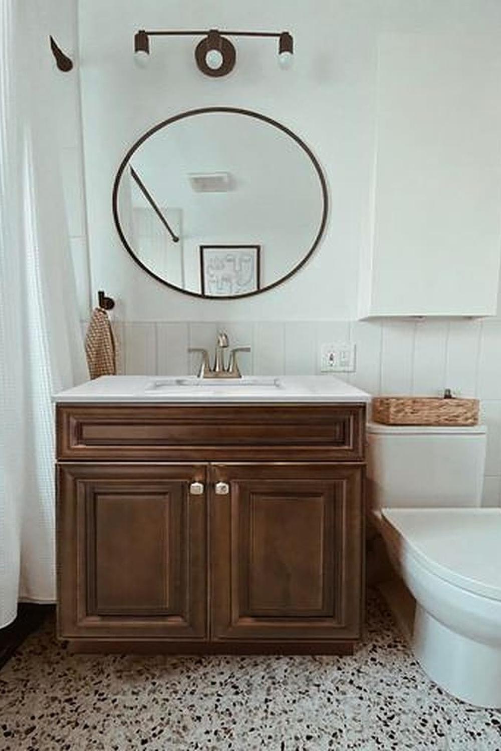 Inviting walnut bathroom vanity creating an open and airy atmosphere.