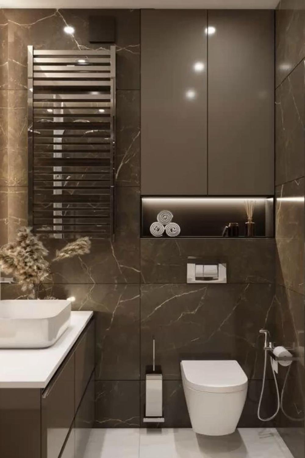 A bathroom design featuring elegant brown marble wall tiles that contrast with a white sink and dark wood vanity.