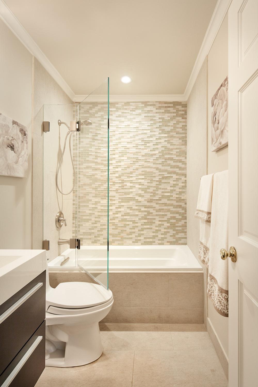 A tranquil bathroom featuring minimalistic fixtures and natural hues.