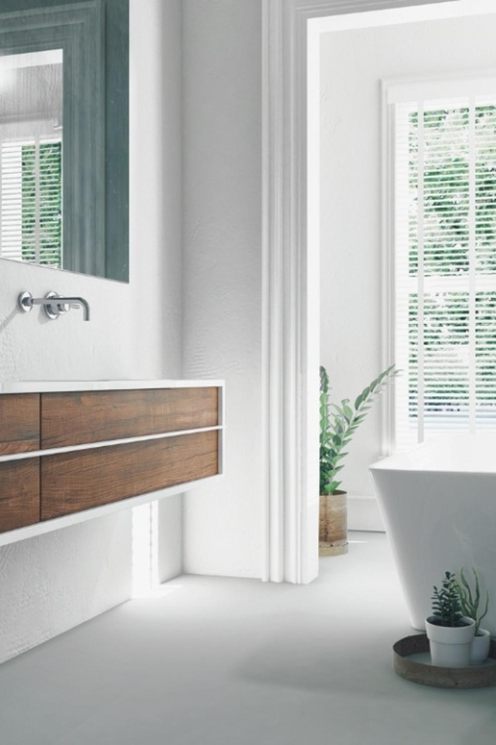 A rustic minimalistic bathroom with shiplap walls and modern fixtures.