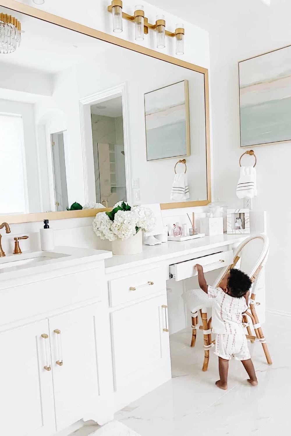 A serene bathroom featuring a spacious open layout and a luxurious freestanding bathtub.