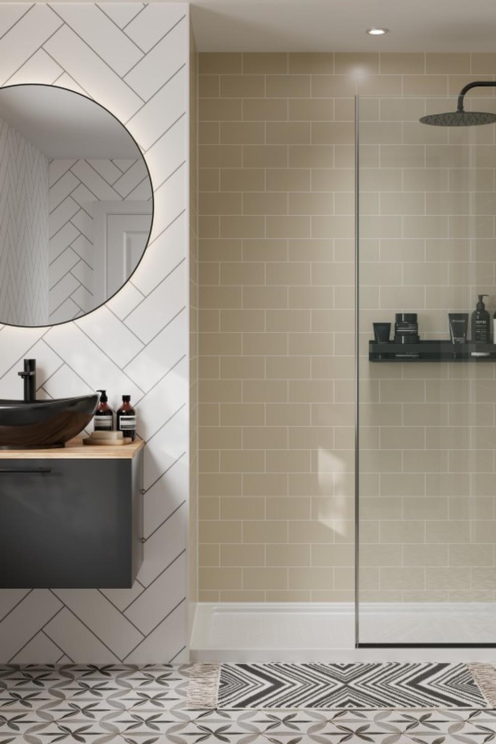 Modern bathroom with herringbone walls and dark gray vanity
