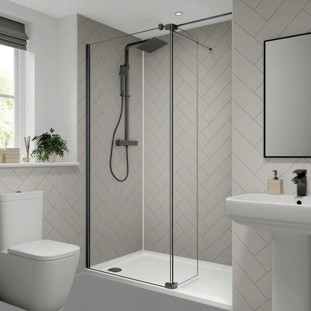 Stylish bathroom shower with herringbone tiles and minimalist design