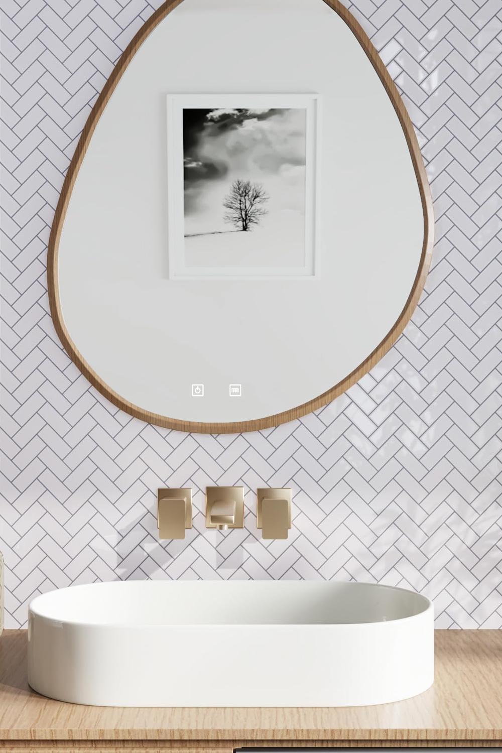 Stylish bathroom with an oval basin sink and framed artwork