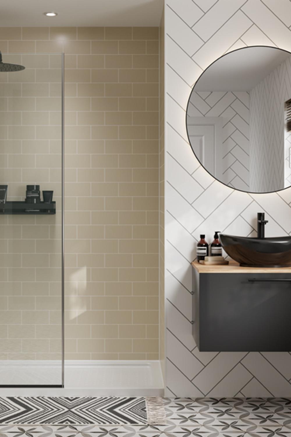 Modern bathroom featuring herringbone tiles and sleek black fixtures