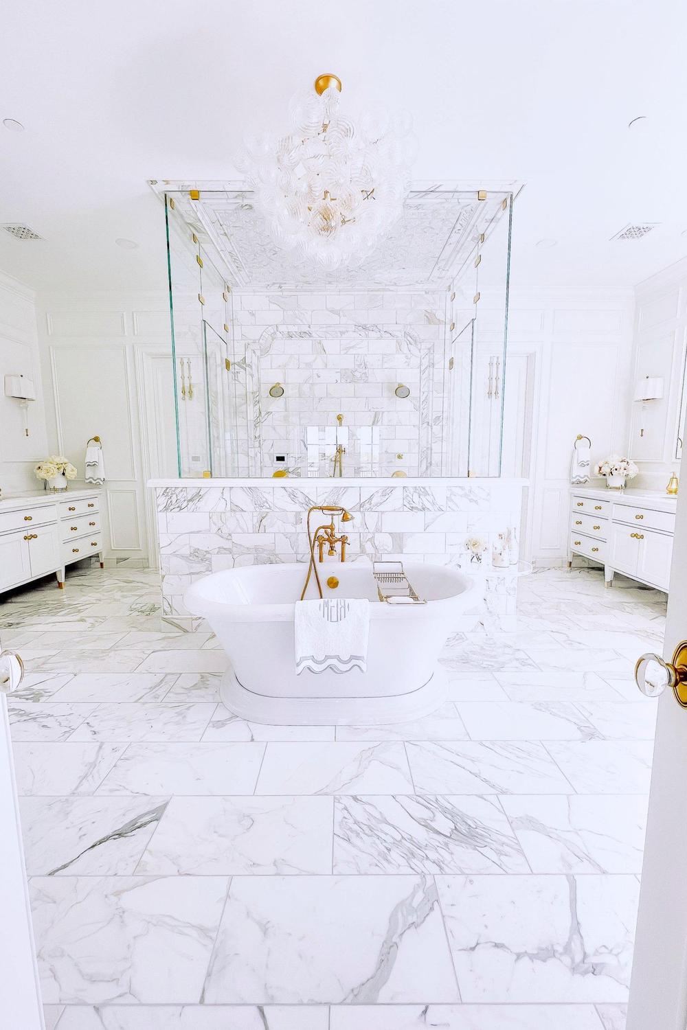 A sumptuous bathroom showcasing rich textures and luxurious features.