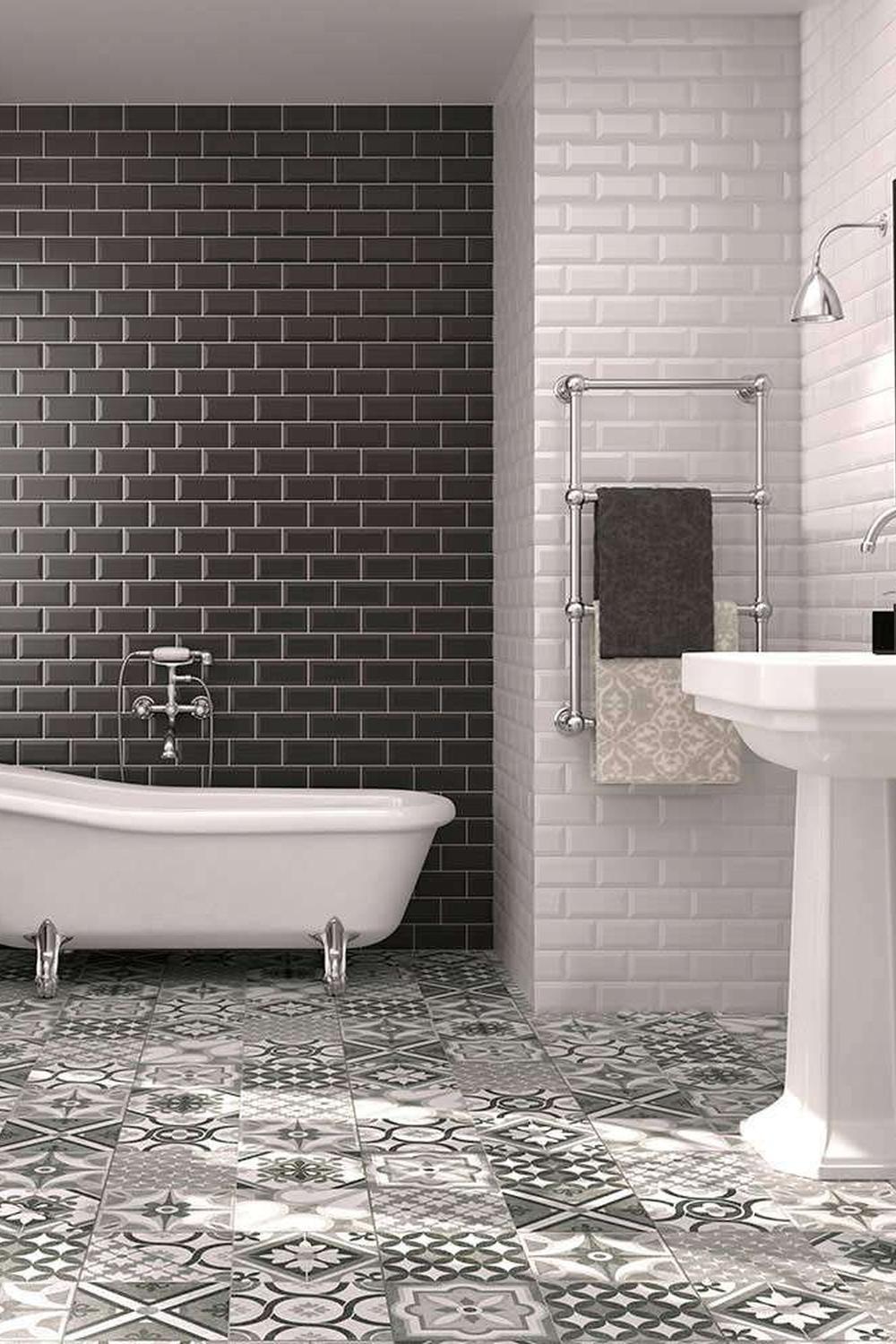 Stylish bathroom featuring contrasting dark grey and white metro tiles