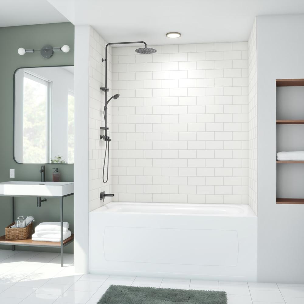 Inviting bathroom featuring a sleek freestanding bathtub, stylish tiles, and contemporary fixtures.